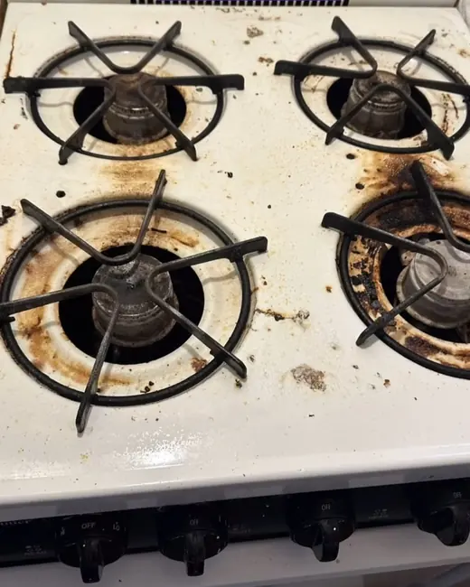 A stovetop before cleaning